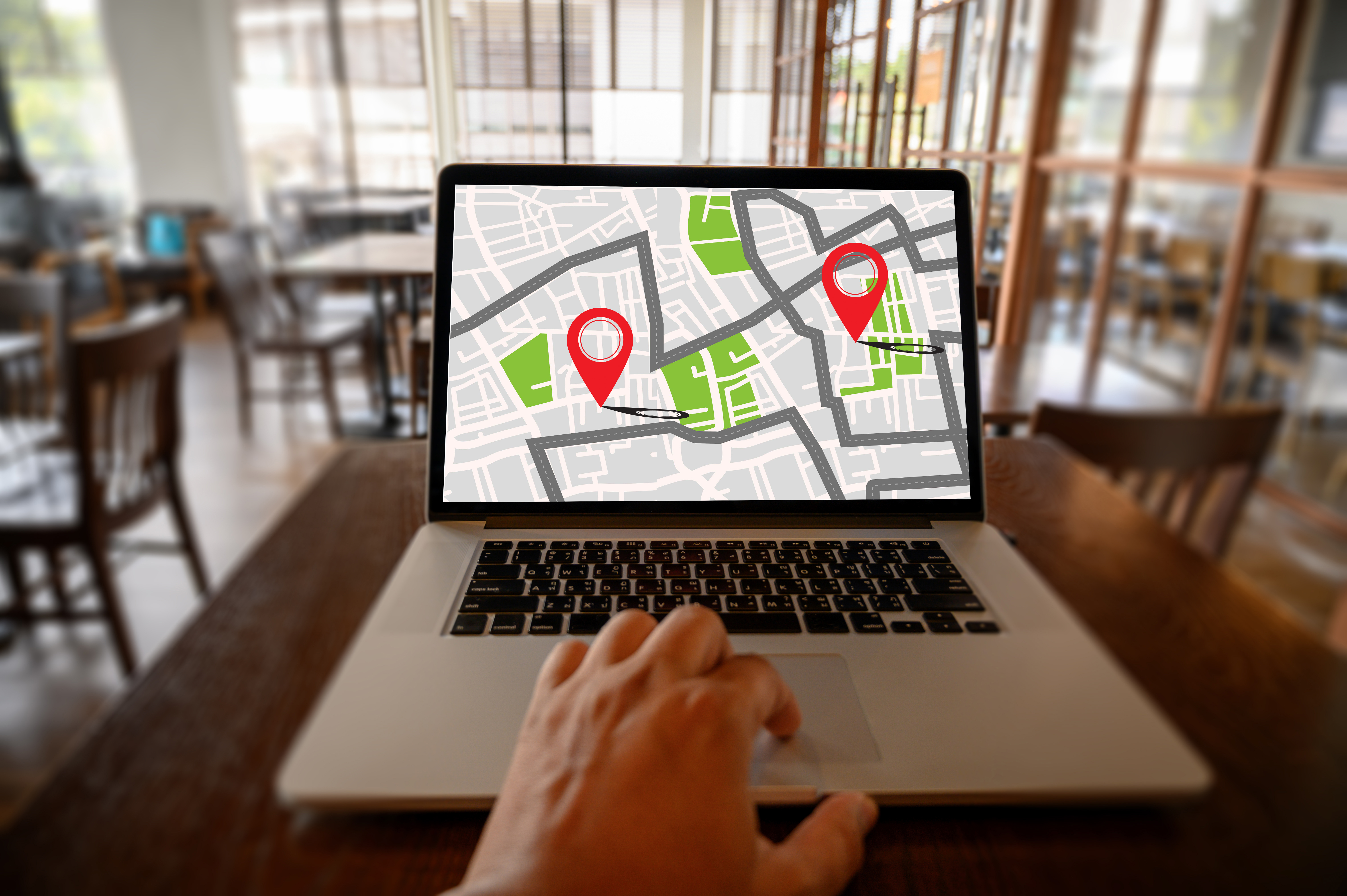 low-section-person-using-laptop-table