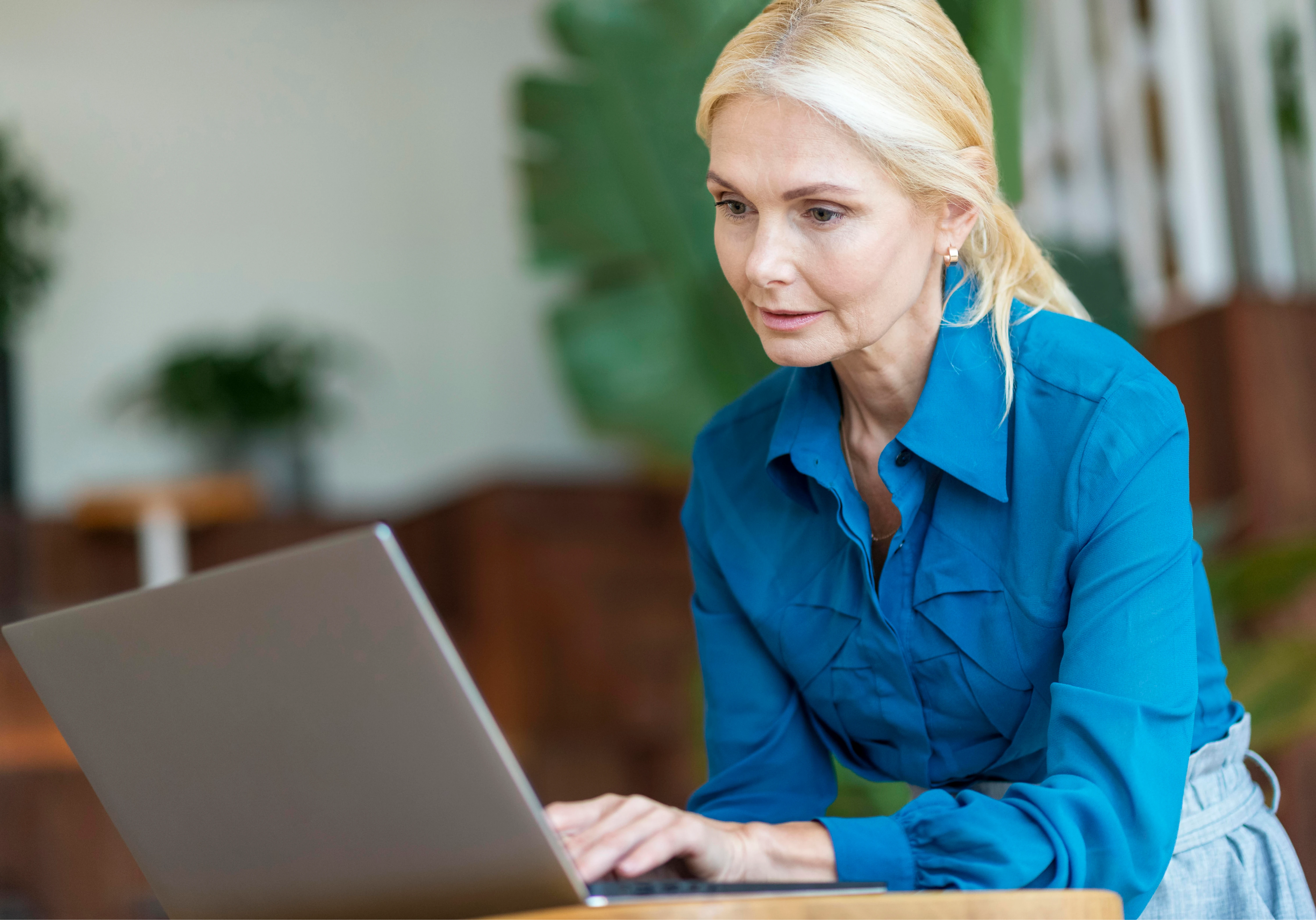 side_view_older_woman_working_laptop_while_out_1
