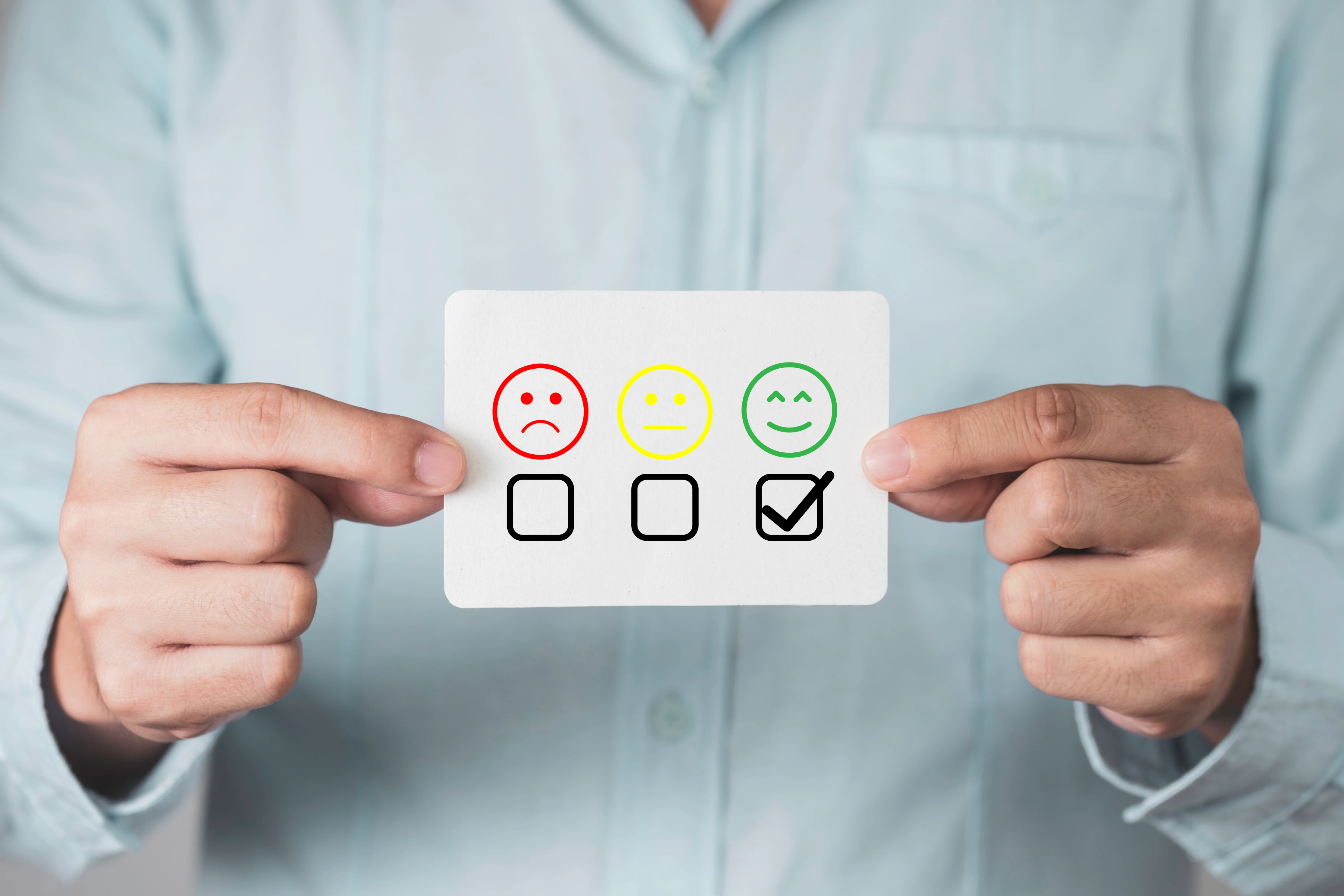 businessman_holding_evaluation_sheet_1